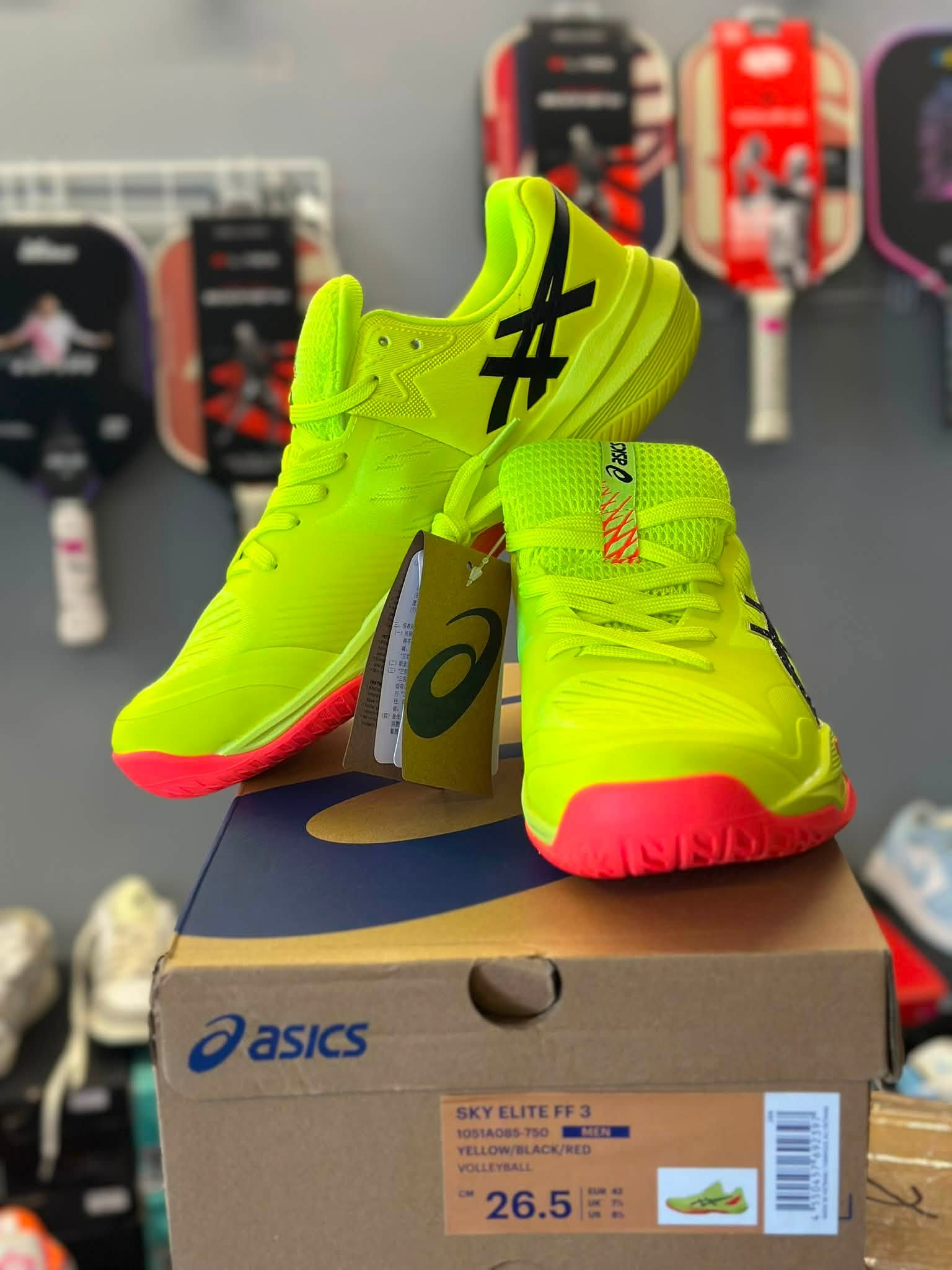 ASICS Sky Elite FF 3 court shoes in yellow, black and red